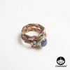Ring with polished Amethyst oval gemstone and decorative braided multi-metal ring band. – Chakvana.com