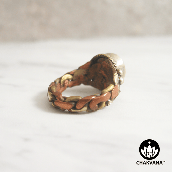 Ring with Om symbol, turquoise gemstone, and braided pattern multi-metal band. – Chakvana.com