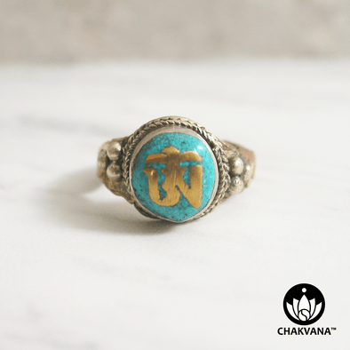 Ring with Om symbol, turquoise gemstone, and braided pattern multi-metal band. – Chakvana.com