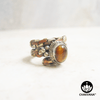 Ring with polished Tiger's Eye oval gemstone and decorative braided multi-metal ring band. – Chakvana.com